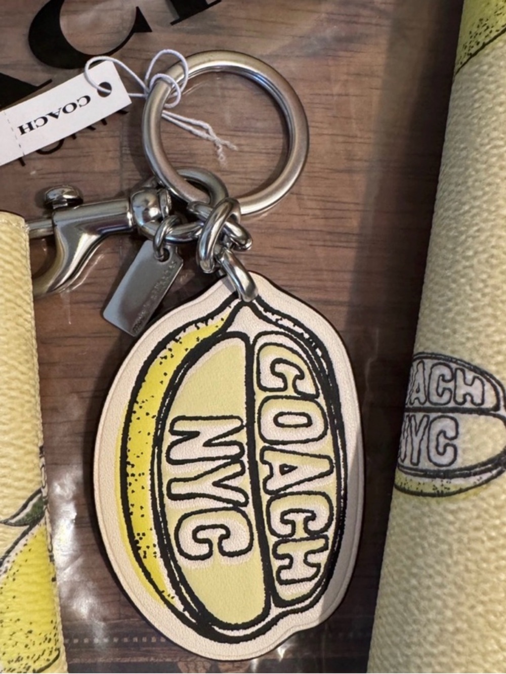 NWT Coach Lemon print Leather Purse Charm or Key Ring.